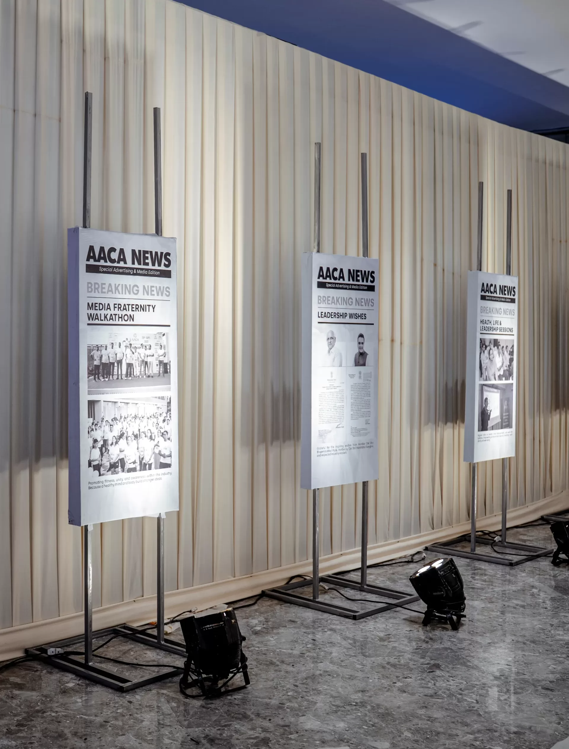 Illuminated newspaper displays at AACA Media Awards